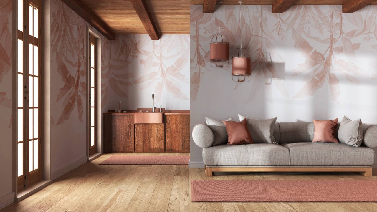 A chic, modern living room with soft orange and beige designer wallpaper throughout the space at Dreamweaver Interiors & Fabrics near Rehoboth Beach, DE