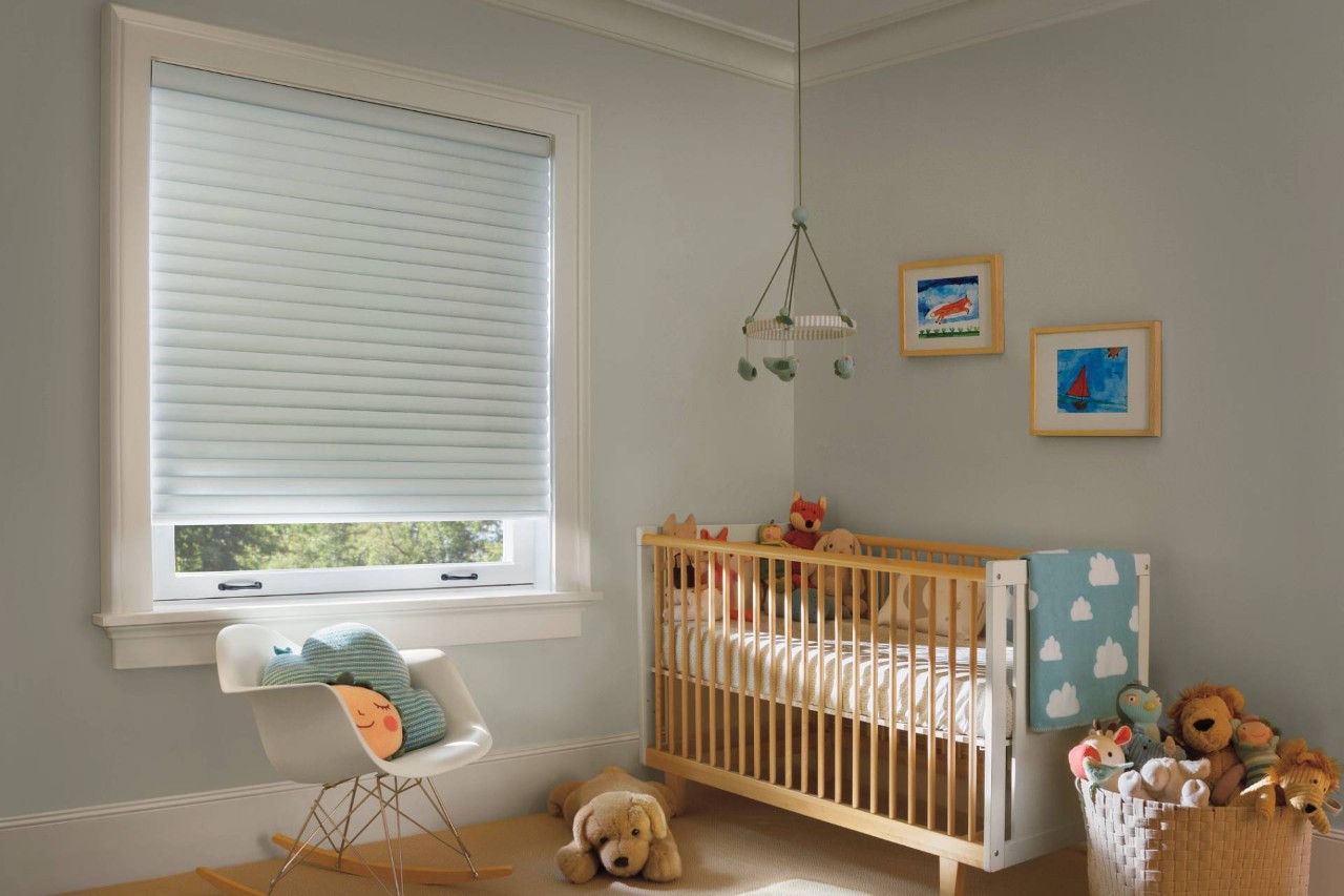 Hunter Douglas Sonnette® Roller Shades, cordless window shades, in a calming and minimalistic nursery near Rehoboth Beach, Delaware
